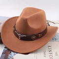 Brown western felt cowboy hat featuring leather band and vintage metal ox head badges - Leather Strap Bull Head / Caramel