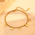 Detail of a gold stainless steel bracelet featuring shell inlays and Roman numerals - White Shell Round Gold Bracelet (T209)