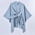 Detail of light blue shawl featuring soft fabric texture and elegant fringe tassels - Solid Color Tassel Tie / Light Blue Grey