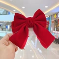 Large red velvet bow hair clip for girls, held in hand with soft fabric texture - Large Double-layer Bow / Red