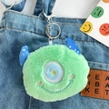 Cute green furry monster coin purse keychain accessory on blue denim overalls - Little Monster Coin Purse - Green