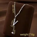 Silver-tone titanium steel V-letter pendant necklace with asymmetric link chain design - Letter V / Silver