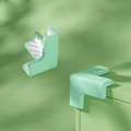 Paraspigoli a L in silicone verde menta con retro autoadesivo per sicurezza bambini - Forma a T Verde