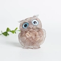 Handcrafted owl figurine made of natural brown crystal stones and resin with blue eyes - Sunstone