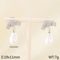 Silver bow knot pearl earrings with baroque pearls on a minimalist display stand - Knotted Baroque Pearl Style (Style G Silver KE116092-GC)