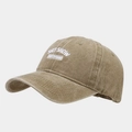 Gros plan sur la casquette en coton délavé kaki avec broderie blanche SHIT SHOW - Réglable / Kaki