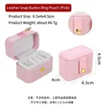 Pink faux leather jewelry box for rings with gold button and white velvet interior - Pink