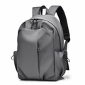 Minimalist grey nylon backpack with spacious main compartment and woven zipper pullers - Gray