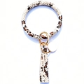 Beige snakeskin faux leather wristlet keychain with fringe tassel and gold hardware - Snake Print