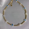 Goldene Edelstahlkette mit weißen Perlen und blauen bösen Blick Sternanhängern - 5# (Böser Blick Stern Halskette)