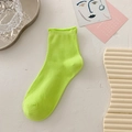 Neon green crew cotton socks with stylish rolled edges displayed on a minimal background - One Size / Neon Yellow