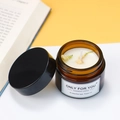 Handmade soy wax candle in brown glass jar with dried flower petals and black cap - Jasmine Petals