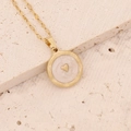 Detailed shot of gold heart owl pendant necklace with cream inlay on stone background - Cream White Round Plate With Gold Heart (1#)