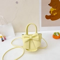 Chic yellow crossbody bag with large decorative bow and top handle for girls - Yellow