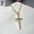 Close-up of golden cross pendant with micro-inlaid zircons on white ceramic stand - Minimalist White Zircon Cross