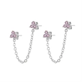 Macro view of silver ear cuff chain featuring sparkling pink zirconia flower studs - Silver/Purple Zirconia