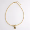 Golden mesh chain necklace with aircraft and blue crystal tree pendant charm details - Round Tree of Life Charm