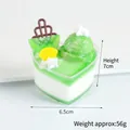 Modello di cupcake a cuore in miniatura con kiwi verde e gelato per la casa - verde mela
