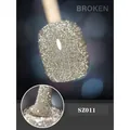 Macro shot of silver diamond glitter nail polish texture with SZ011 brush detail - 8ml / Golden Brown SZ11