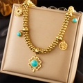 Gouden ketting met turquoise klavertje, zon en levensboom-hangers in goud - Vintage Turquoise Klavertje Levensboom Multi-Hanger Stijl (N2710)