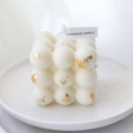 White bubble cube candle with gold foil flakes and a handmade cotton wick tag - White Gold Foil - Rose