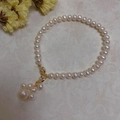 Close-up of Baroque freshwater pearls with 14K gold plated clasp and pearl cluster detail - Pearl Bear Paw Pendant Style (SL7-9)