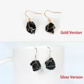 Handcrafted wire-wrapped earrings with irregular raw black stones in gold and silver - Gold Wire Wrapped / Obsidian