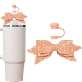 Detail of coral pink silicone straw cover and glittery bow accessory for tumbler cups - Coral Pink