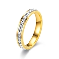 Detail shot of eternity ring with square-cut clear zircons on gold stainless steel band - US 9 / 4 mm / Gold