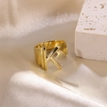 Adjustable gold stainless steel ring featuring a stylish letter K charm design - Letter K / Gold