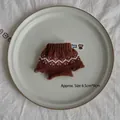 Mini brown knitted sweater ornament with white wave patterns for DIY Christmas decor - Coffee Wave Sweater