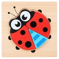 3D wooden ladybug puzzle for toddlers with red wings and blue body on natural wood base - Jm 3d Ladybug