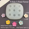Macro detail of 9-cavity silicone flower mold showing precise camellia shapes and dimensions - 9-Hole Five Petal Flower Mold