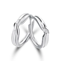 Silver twist couple rings set with minimalist polished finish and small diamond accents - Streamline Twist Rings