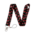 Phone lanyard with red cherry pattern and metal swivel hook on a black background - Black Cherry