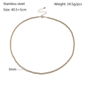 Detailed view of gold plated stainless steel bead necklace with lobster clasp and chain - 3mm
