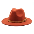 Detail of rust-red felt fedora hat featuring a brown snakeskin pattern leather belt strap - M (56-58cm) / Brick Red
