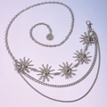 Detail of silver multi-layer body chain with sun face pendants and lobster clasp closure - Sun Double Layered Chain (Silver)