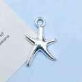 Polished silver starfish pendant charm with a circular hanging loop for DIY jewelry making - 11x19mm / Antique Silver Starfish