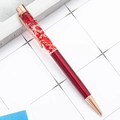 Creative rose gold ballpoint pen with transparent barrel featuring dried red flowers - Transparent Red