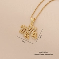 Golden heart necklace with MOM lettering and inlaid diamonds on a soft beige fabric background - Jina Letter Zirconia Style (11#)