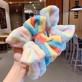 Detailed view of rainbow striped plush bow headbands for washing face and skincare - Striped Mixed Colors