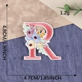 Pink letter R embroidery patch with colorful floral accents for clothing decoration - Letter R / Hot Melt Adhesive