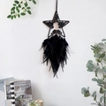 Detail view of black dream catcher with star-shaped frame and tree of life on white wall - Comet (Black) Feather Tree