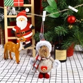 Dettaglio di una bambola di Natale in peluche con maglione in maglia e cappello con corna - Addobbo Renna Grigio