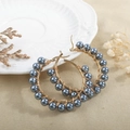 Detail of handmade wire-wrapped dark grey pearl beads on large gold stainless steel hoops - Dark Gray