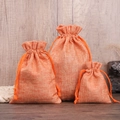 Three-piece set of orange linen drawstring jewelry pouches in small, medium, large sizes - 7*9cm / Orange