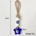 Star-shaped blue evil eye glass wall hanging with jute rope and beads 18cm length - Blue Star