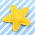 Yellow faux leather star-shaped charm with matching stitching and metal connector - Yellow