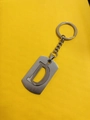 Polished silver stainless steel keychain featuring a hollow letter D charm and ring - Letter D